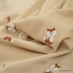 Tissu jersey motif petits renards fond beige - Oeko tex standard 100
