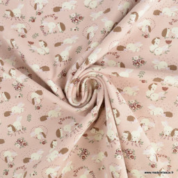 Tissu jersey motif hérissons, lapins et fleurs fond saumon - Oeko tex standard 100