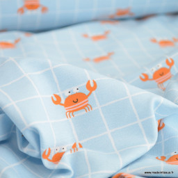 Tissu jersey motif crabes fond bleu à carreaux - Oeko tex standard 100