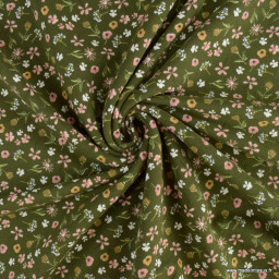 Tissu sweat French terry motif floral fond vert bouteille envers gratté