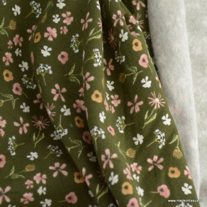 Tissu sweat French terry motif floral fond vert bouteille