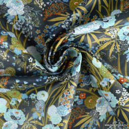 Tissu coton Enduit Harmonie motifs fleurs japonaises fond indigo