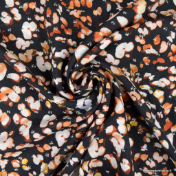 Tissu Viscose motif léopard fond noir