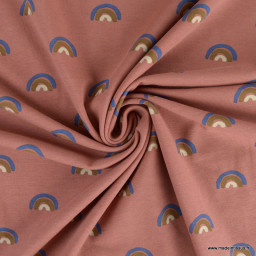 Tissu jersey motif arc en ciel fond vieux rose - Oeko tex standard 100