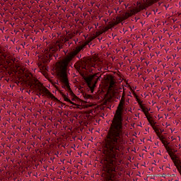 Tissu coton popeline motifs fleurs de Lys fond Grenat