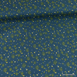 Tissu coton popeline motifs arbres et feuilles fond bleu