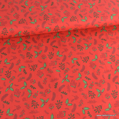 Tissu de Noël motif branches de houx et de sapins fond rouge - Oeko tex