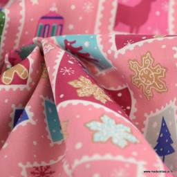 Tissu de Noël motif timbres et flocons fond rose - OEKO TEX