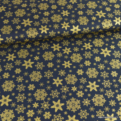 Tissu de Noël motif étoiles de neiges or fond bleu marine - Oeko tex