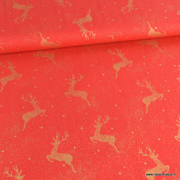 Tissu de Noël motif rennes or fond rouge - Oeko tex