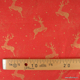 Tissu de Noël motif rennes or fond rouge - Oeko tex