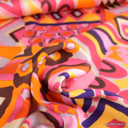 Tissu crêpe envers satin motif ethnique orange et rose