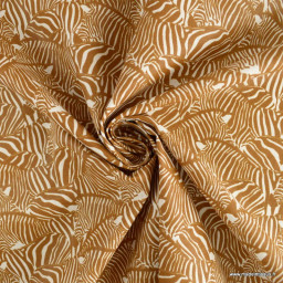 Tissu cretonne coton Khumba motifs zèbres fond camel