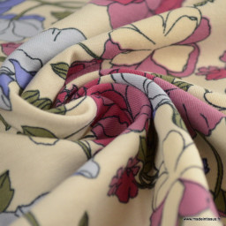 Tissu jersey motif fleurs lilas et rose fond écru - Poppy Fabrics