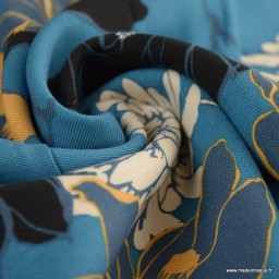 Tissu twill Viscose motif fleurs fond bleu