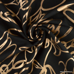 Tissu Jersey milano lourd motif graphique doré fond noir