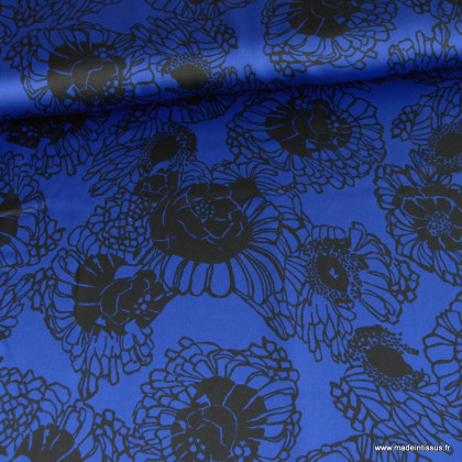 Tissu Satin motif fleurs noires fond bleu roi