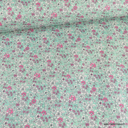 Tissu coton Enduit motif fleurs roses fond turquoise