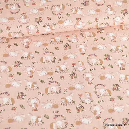 Popeline de coton motif lapins, hérissons et fleurs fond rose - Oeko tex