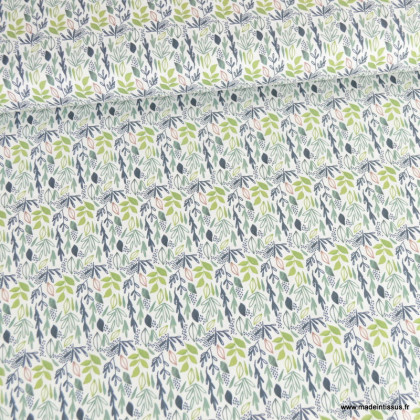 Tissu coton Lion motif petites feuilles exotiques vertes fond blanc