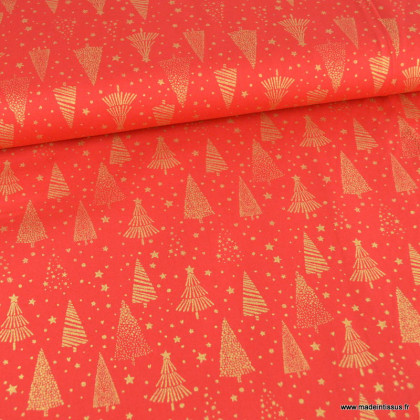 Tissu de Noël motif foret de sapins et étoiles or fond rouge - Oeko tex