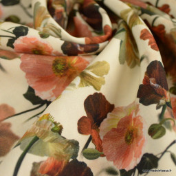 Tissu Viscose motif fleurs orangées fond écru