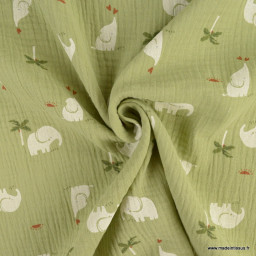 Tissu Double gaze Sheena motif éléphants et palmier fond vert amande - oeko tex