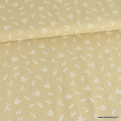 1 coupon de 56 cm Tissu popeline motifs petites feuilles fond beige - Oeko tex