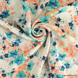 Tissu Viscose motif fleurs aquarelle turquoise fond écru