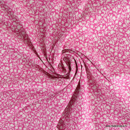 Popeline de viscose motif petites fleurs fond rose