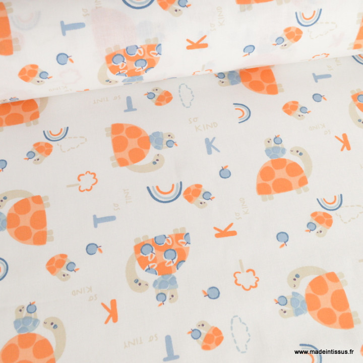 Tissu Coton Bekitou motif Tortues oranges fond blanc - oeko tex