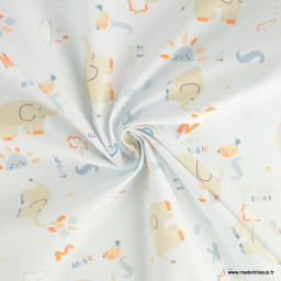 Tissu Coton Padao motif éléphants et arcs en ciel fond bleu clair - oeko tex
