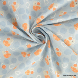 Tissu Coton Bekkou motif Tortues oranges fond bleu - oeko tex