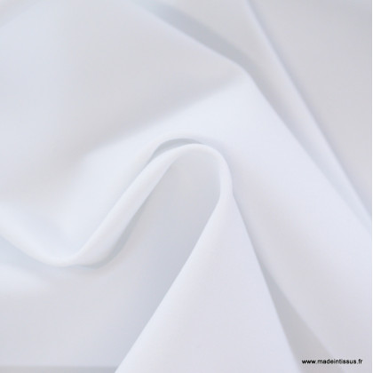 Tissu pour pantalon d'équitation maille stretch blanc.
