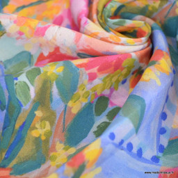 Tissu Viscose Izia motif fleurs oranges, roses, bleues et vertes