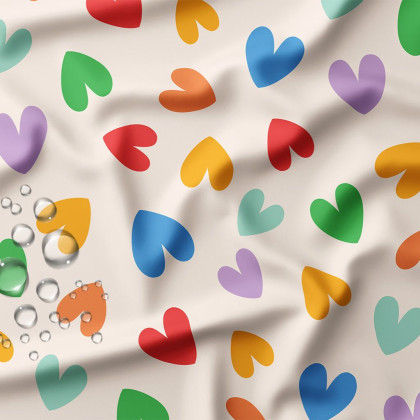 Tissu imperméable Chrichri type ciré motif coeurs multicouleurs