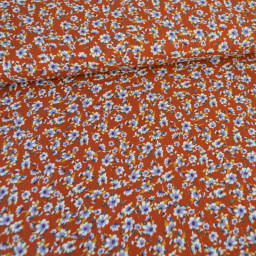 Tissu crêpe de Viscose lurex Irina motif fleurs fond Terracotta