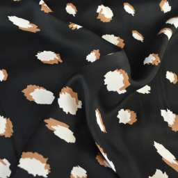 Tissu Satin de viscose motif leopard camel fond Noir