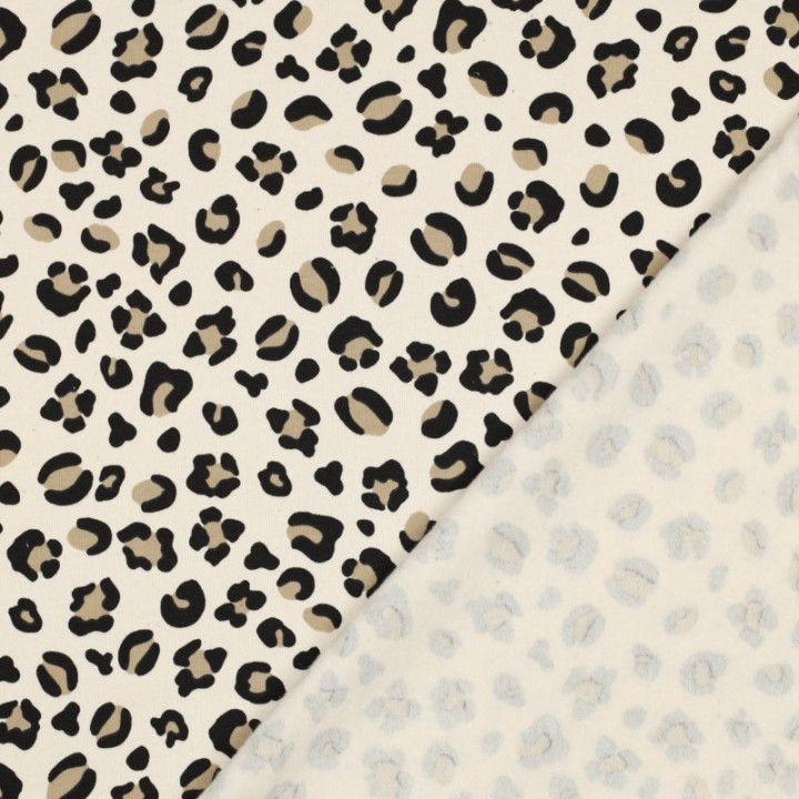 Tissu Sweat molleton motifs Léopard fond milk