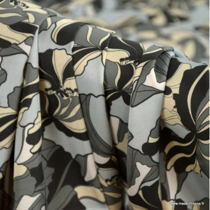 Tissu Satin motif fleurs noires fond gris
