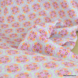 Tissu gaufré en coton motifs floraux graphique roses