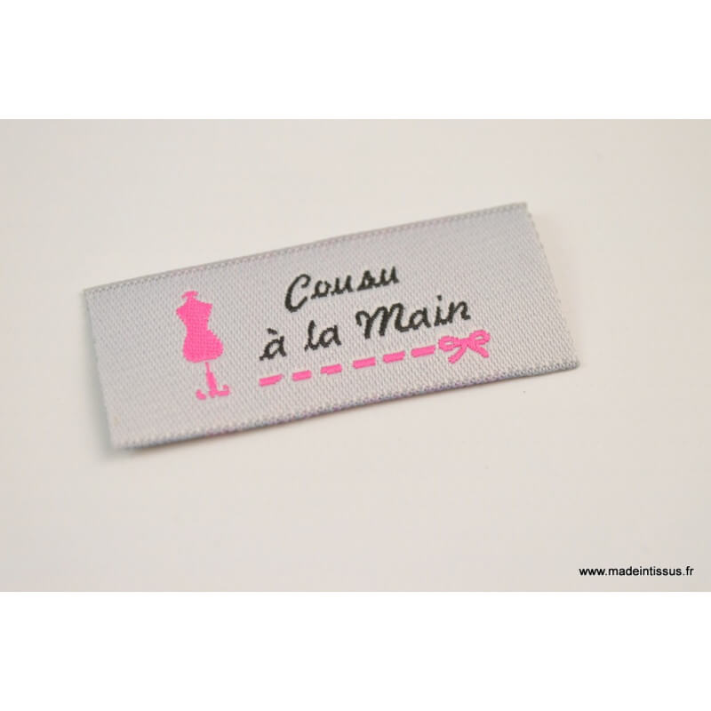 Étiquette tissée grise et rose avec message cousu main dim 20 x 45mm