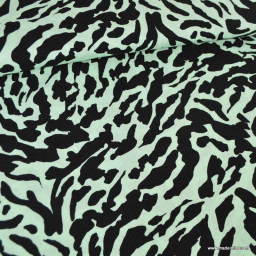 Tissu viscose bambou – Motif zèbre noir sur fond menthe