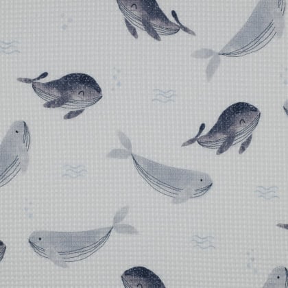 Tissu nid d'abeille motif baleines fond blanc