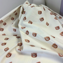 Tissu popeline Brun motif tête d'ours fond écru