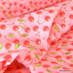 Tissu coton enduit motif cerises 3D – Fond rose pastel
