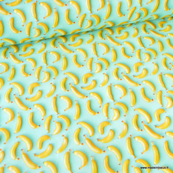 Tissu coton enduit motif bananes 3D – Fond vert menthe