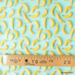 Tissu coton enduit motif bananes 3D – Fond vert menthe
