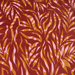 Tissu Satin de coton motif feuillage exotique fond terracotta