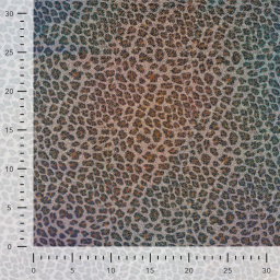 Tissu imperméable type ciré motif léopard à paillettes